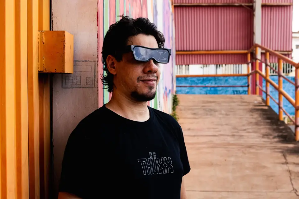 THUXX wearing LED glasses and the THÜXX t-shirt